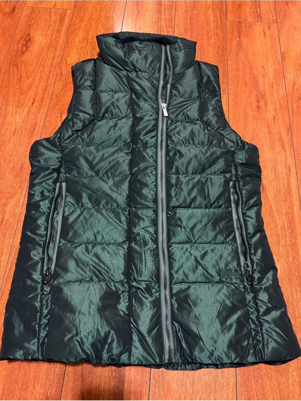 Helly Hansen Dark Green Quilted women’s Vest with Zipper Pockets